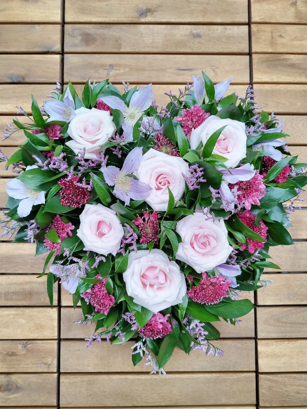 Floriana Floristry Funeral Heart with Pale pink roses and darker pink flowers